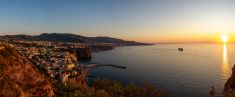 SORRENTO SUNSET BY SMALL BOAT